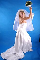 Click image for larger version. 

Name:	christy_mcnicol_in_her_white_bridal_dress__the_worlds_sexiest_bride__886.jpg 
Views:	13935 
Size:	50.6 KB 
ID:	234932