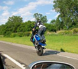 Click image for larger version. 

Name:	ridin wheelies.jpg 
Views:	462 
Size:	77.9 KB 
ID:	357722