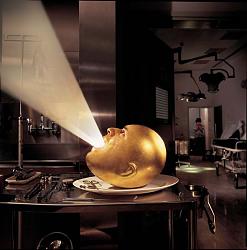 Click image for larger version. 

Name:	591px-the_mars_volta-de_loused_in_the_comatorium-2003-cover.jpeg 
Views:	403 
Size:	53.5 KB 
ID:	575100