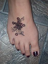 Click image for larger version. 

Name:	Latest-Tattoo-on-Foot-for-Women-2011.jpg 
Views:	6118 
Size:	136.4 KB 
ID:	417963